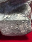 Inuit Soapstone Carving: Man and Seal Design
