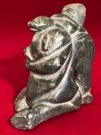 Inuit Soapstone Carving: Man and Seal Design