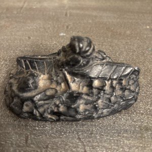 Inuit Soapstone Carving of Eskimo in Kayak