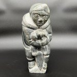 Inuit Soapstone Hunter with Sea Otter Sculpture