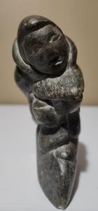 Inuit Soapstone Figure Holding Fish Sculpture