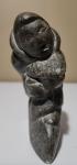 Inuit Soapstone Figure Holding Fish Sculpture
