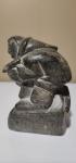 Inuit Soapstone Figure Holding Fish Sculpture
