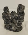 Wolf Soapstone Eskimo Sculpture: Man, Woman, Seal