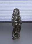 Inuit Soapstone Carving: Man with Seal Sculpture