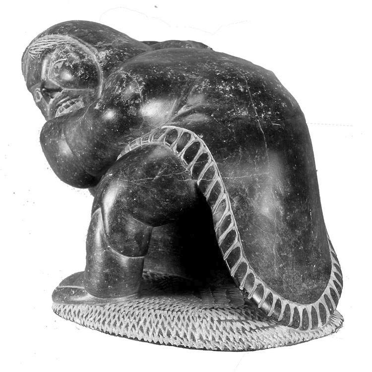 Inuit Soapstone Eskimo with Seal Carving