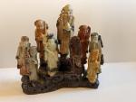 Soapstone Eskimo Carving with 9 Figures on Stand