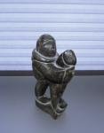 Inuit Soapstone Carving of Man with Seal