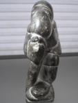 Inuit Soapstone Carving of Man with Seal