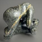 Inuit Soapstone Carving: "Bear Overtaking Man