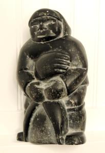 1960s Inuit Soapstone Hunter with Seal Sculpture