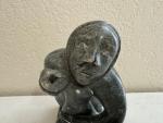 Inuit Soapstone Carving of Man and Walrus