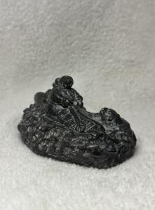 Inuit Soapstone Sculpture: Kayak with Seal