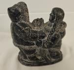 Hand Carved Soapstone Wolf Sculpture with Inuit Figures