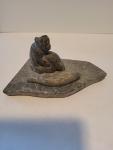 Vintage Soapstone Hunter with Seal Figurine