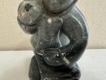 Inuit Soapstone Carving: Man and Walrus by Joshua Sheeg