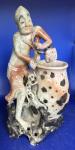 Humorous Soapstone Carving: Man with Vase, Monkey, Dog