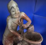 Humorous Soapstone Carving: Man with Vase, Monkey, Dog