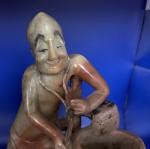 Humorous Soapstone Carving: Man with Vase, Monkey, Dog