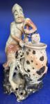 Humorous Soapstone Carving: Man with Vase, Monkey, Dog