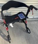 Drive HEAVY DUTY WIDE rollator walker f-22 with red suspension springs.