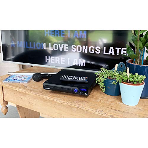 Compact DVD player with karaoke & multiple outputs