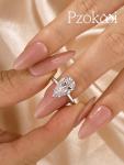 Pzokooi Elongated Pear Shaped Engagement Ring