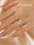 Pzokooi Elongated Pear Shaped Engagement Ring