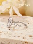 Pzokooi Elongated Pear Shaped Engagement Ring