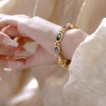 Gosasa Vintage Gold Women's Watch with Gemstone Dial