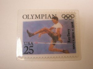 Olympics 25 Cent Ray Ewry Stamp Lapel Pin