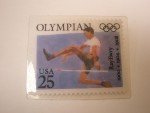 Olympics 25 Cent Ray Ewry Stamp Lapel Pin
