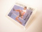 Olympics 25 Cent Ray Ewry Stamp Lapel Pin