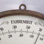 Vintage Round Advertising Thermometer from Early 1900s