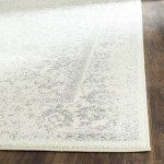 Ivory and Silver 9' x 12' Stained Rug