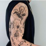 Norseman-Inspired Geometric Full Sleeve Tattoos for Men