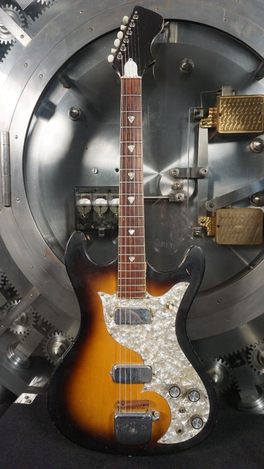 could be rewritten as "1960s Vintage Kay Electric Guitar - Tobacco Burst