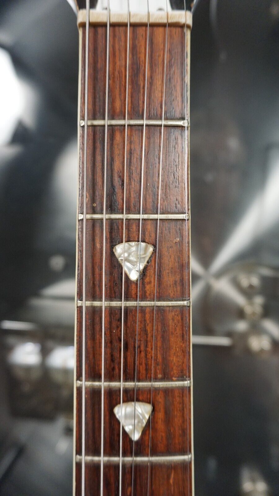 could be rewritten as "1960s Vintage Kay Electric Guitar - Tobacco Burst