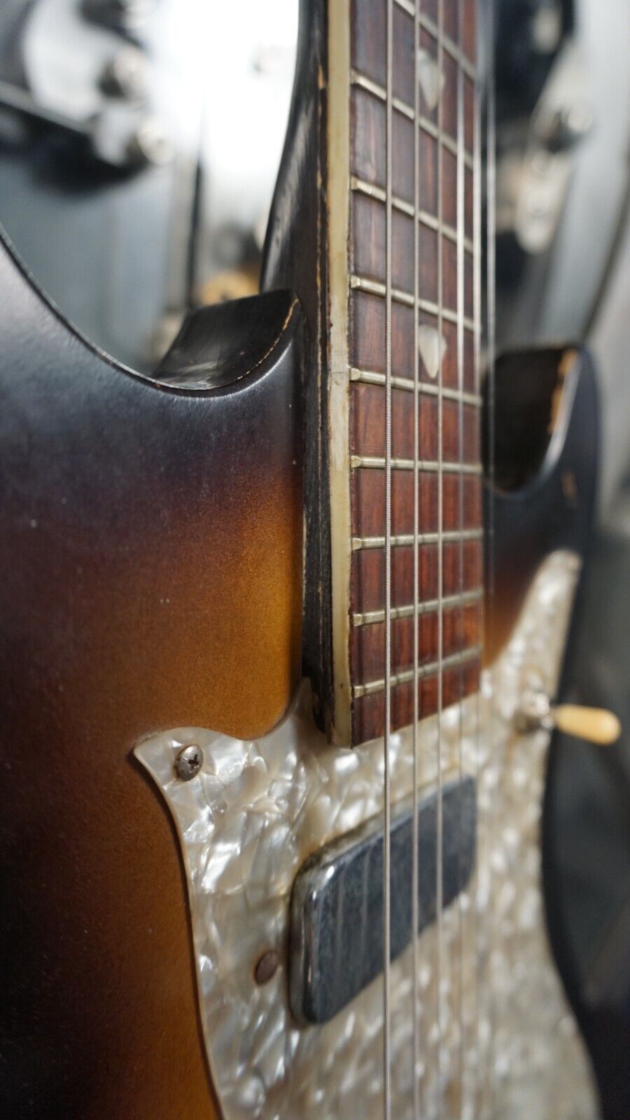 could be rewritten as "1960s Vintage Kay Electric Guitar - Tobacco Burst