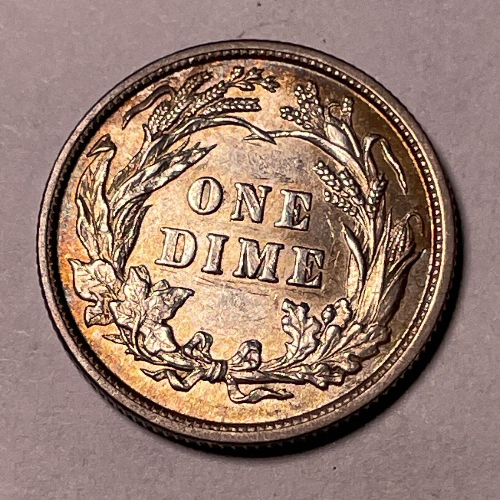 1897 Rainbow Toning Barber Silver Dime AU Coin