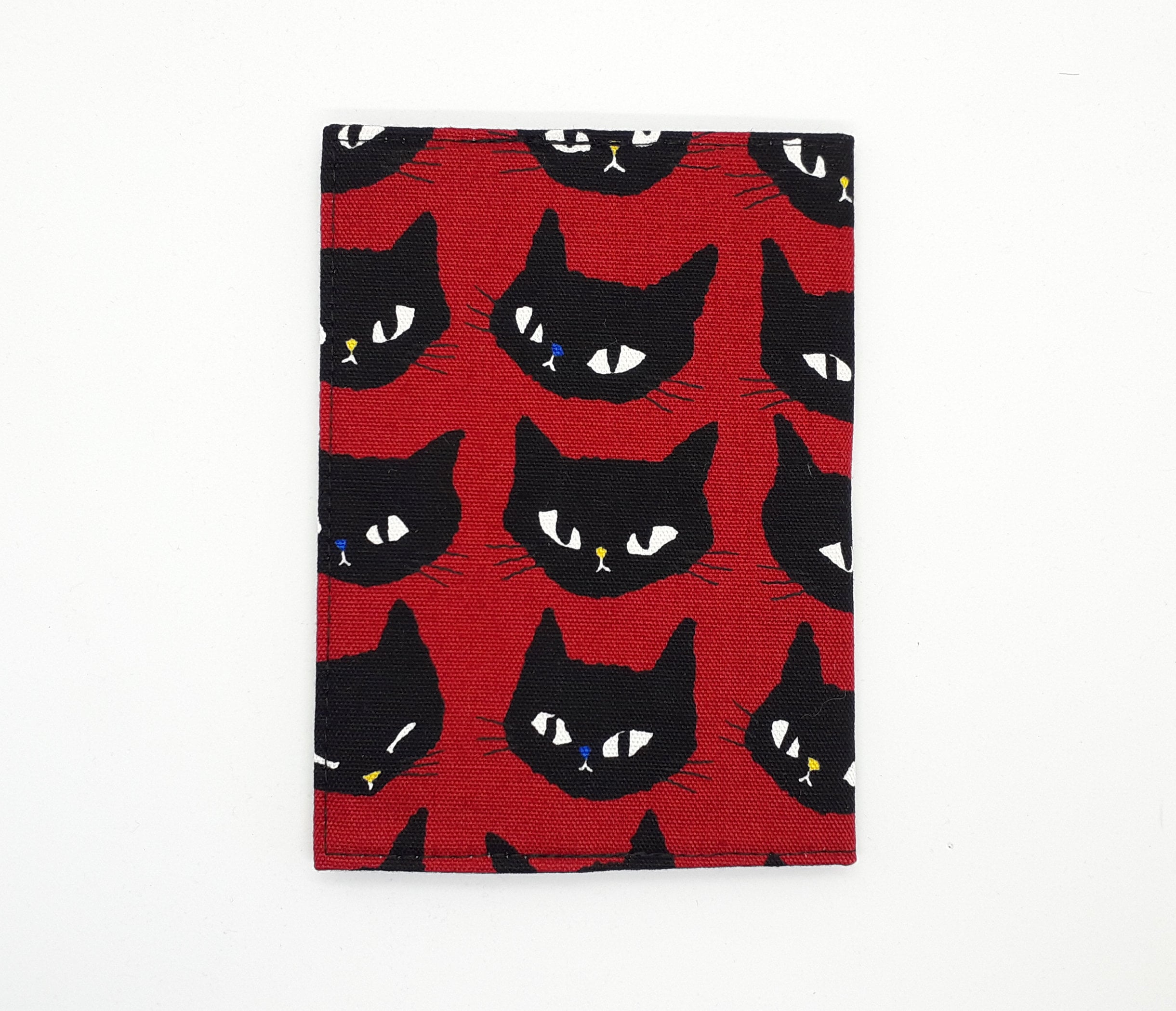 Cat-themed travel essentials in red & black