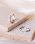 Sparkling Moissanite Huggie Earrings in White Gold