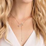 Swarovski Women's Bow Pendant Necklace in Rose-Gold