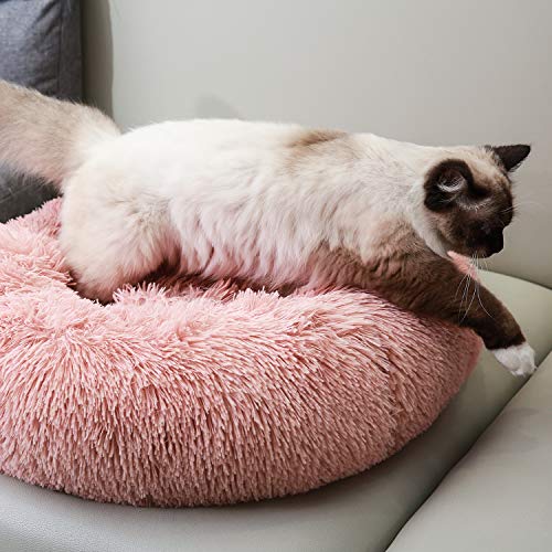 Pink Faux Fur Cat Bed for Improved Sleep