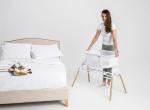 Nested Glide N Go portable bedside crib cot