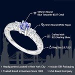 Blue Tanzanite and White Topaz Engagement Ring