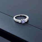 Blue Tanzanite and White Topaz Engagement Ring