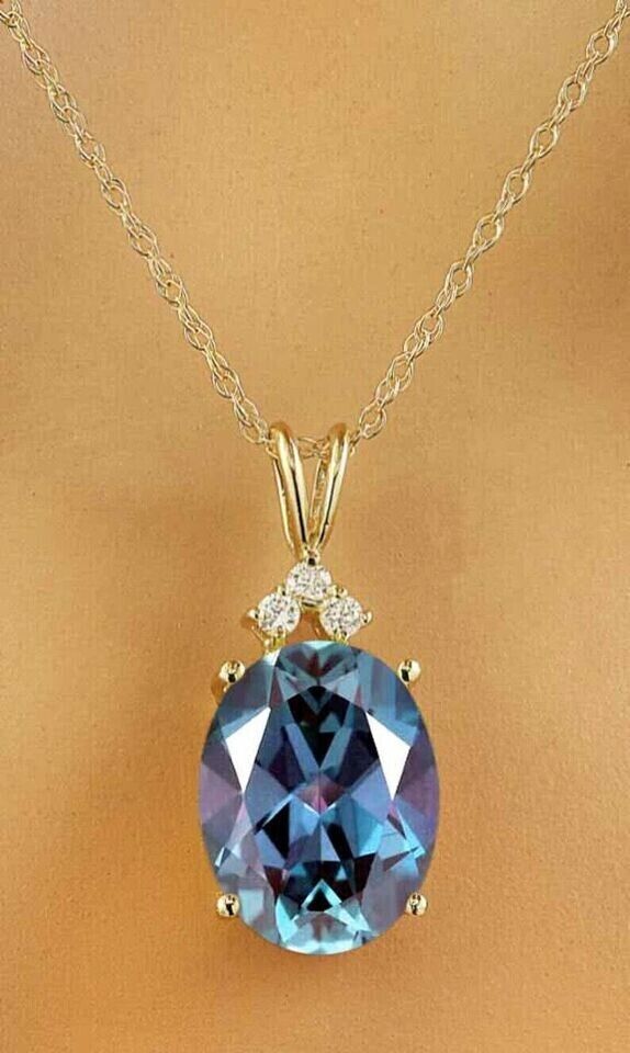 Lab created Alexandrite diamond pendant in 14K gold