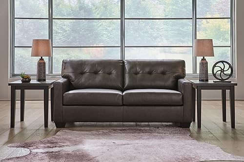 Black Tufted Leather Match Sofa by Ashley