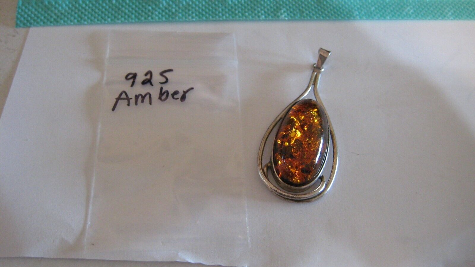 Sterling Silver Amber Pendant in Trendy Style